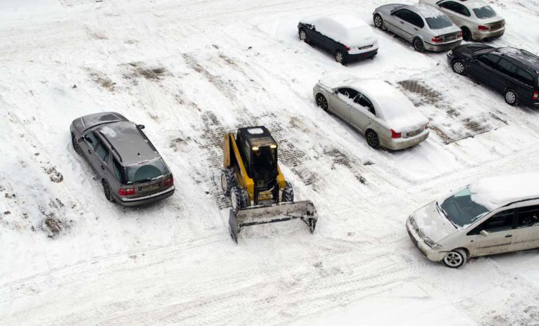 Snow operations team documenting conditions at a commercial property